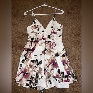 Super cute floral and white Fashion Nova romper/dress